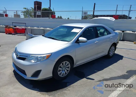 2014 Toyota Camry Le z USA, uszkodzony, nr VIN 4T4BF1FK3ER433285